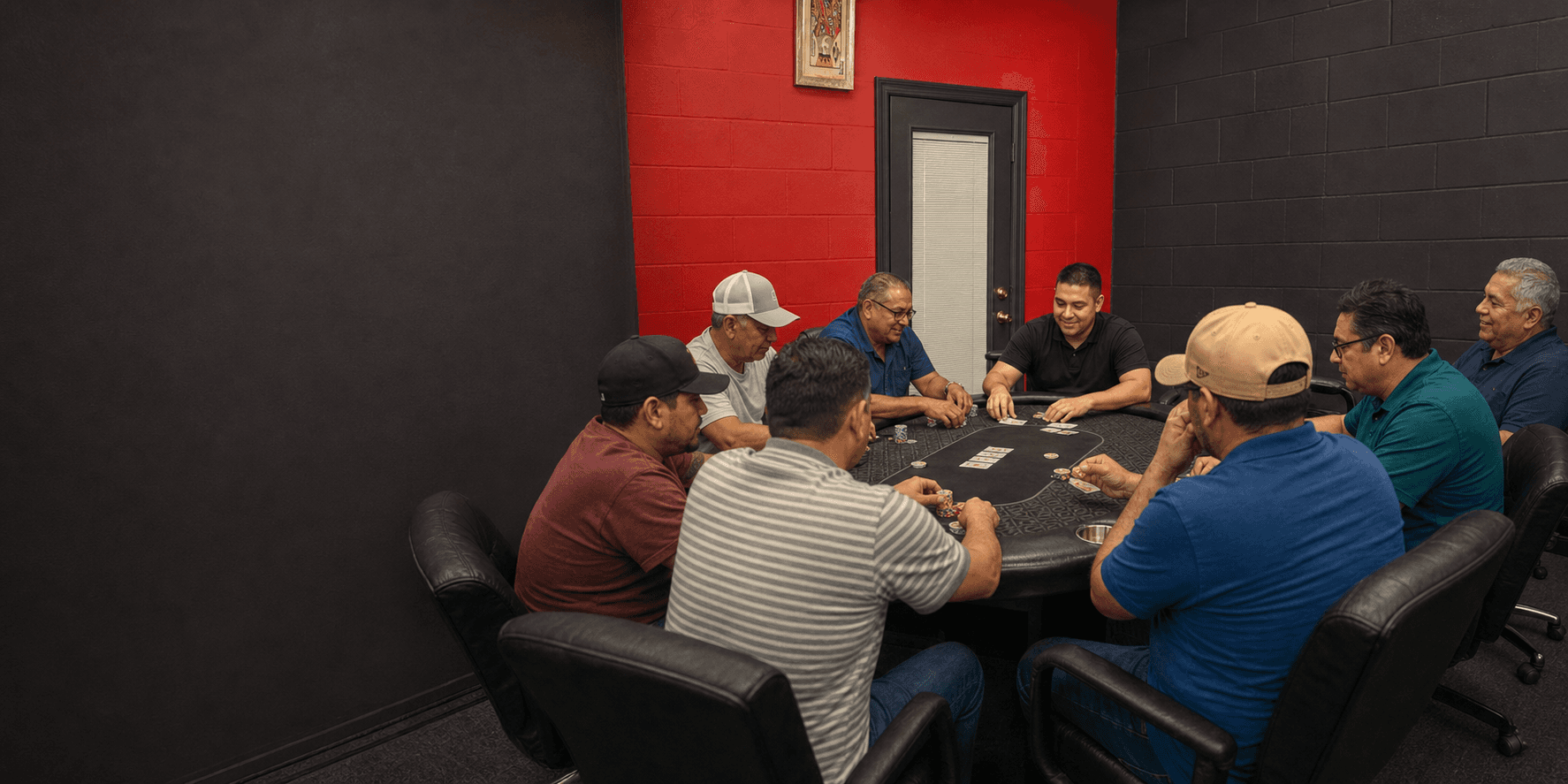 Local players gathered around a table at Suits Social Club
